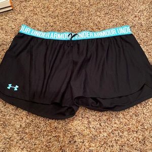 Black under armor shorts with light blue detail